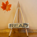 READ -  shelf sitting sign