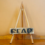 READ -  shelf sitting sign